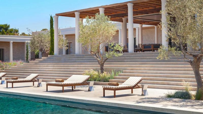 Luxury spa resort in Europe with private pool and Mediterranean wellness architecture representing high-end spa travel and discreet luxury companionship experiences