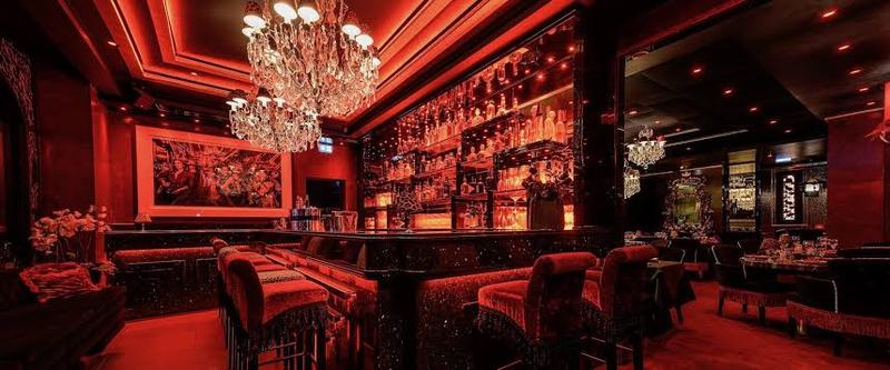 Luxury lounge bar in Monaco with elegant lighting and refined atmosphere